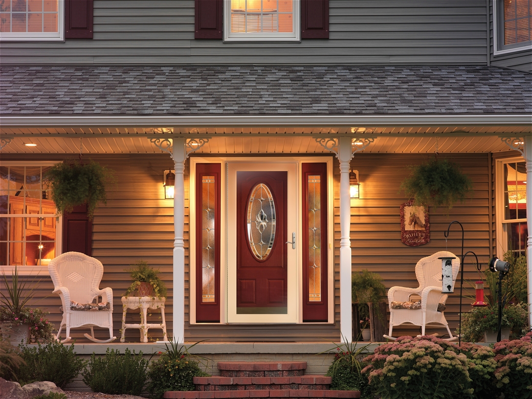 Red residential storm door for the front of the house